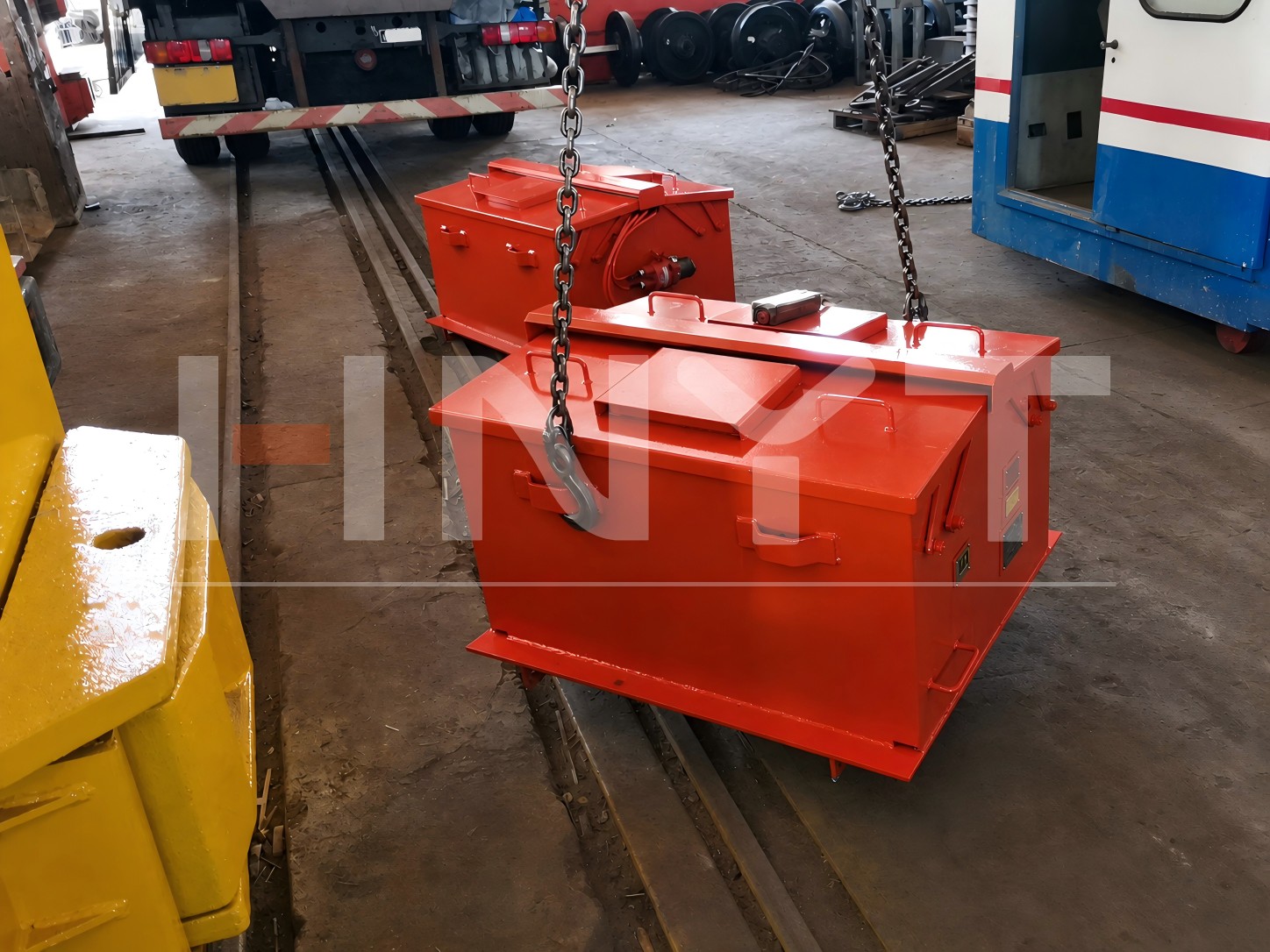 Two explosion-proof power supplies lifted for loading before shipment.jpg