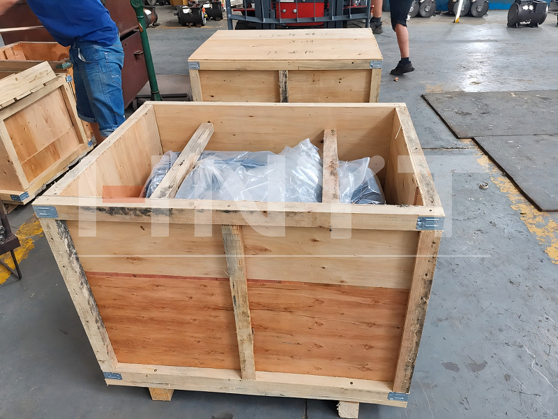 Two 75KW Mining Traction Motors Shipped for Underground Traction Equipment(图2) A motor covered with plastic inside a wooden case during packing.png